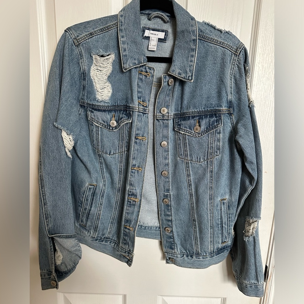 Light wash, oversized, distressed denim jean jacket
